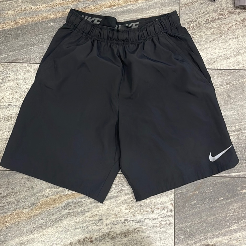 Nike Dri Fit black shorts with pockets. BRAND NEW